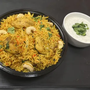 a bowl of rice and a bowl of yogurt