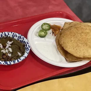 a plate of food on a tray