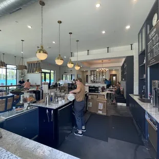 a woman working in a coffee shop