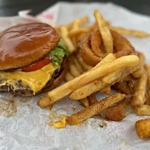 Patty and Frank’s - Great burger and even better fries w/onion rings, tater tots and cheese curds all coated in gravy! Andrew Zimmern