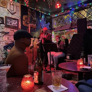 a group of people sitting around a table