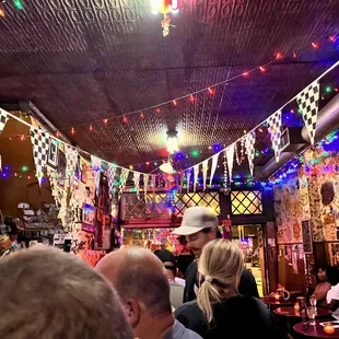 a crowd of people in a bar