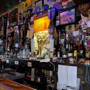 a bar with a variety of liquors