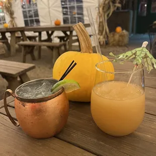 a pumpkin and a cocktail