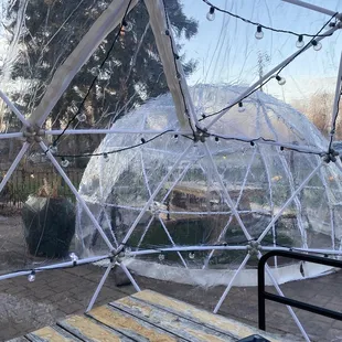 a table with a tablet and a book on it