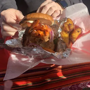 Lomo Saltado Sandwich: sweet potatoes, onions, plantains on the side