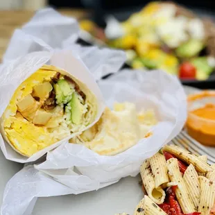 Breakfast Burrito. Amazingly fluffy omelette and such a nice balance of avacado, crunchy bacon and potatoes
