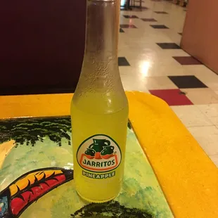 a bottle of soft drink