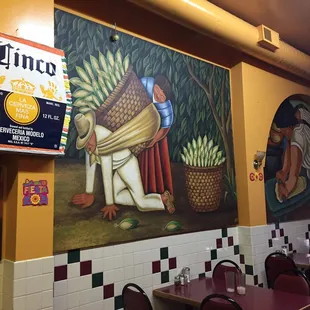 a mural of a farmer