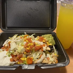 Grilled chicken, vegetables &amp; rice bowl with guacamole &amp; sour cream. And a pineapple Fresca!