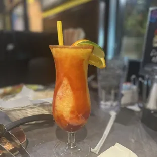 a drink with a slice of lime