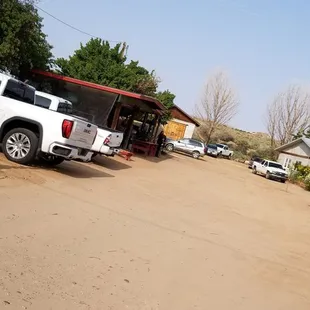a white pickup truck parked in a lot