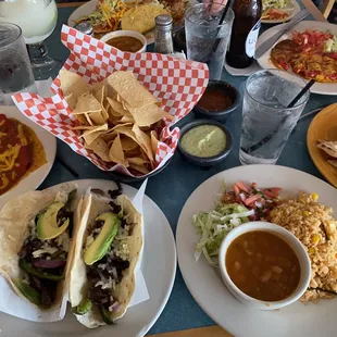 Cheese enchiladas, tacos de alambre, rice, charro beans, side queso, &amp; frozen margarita.