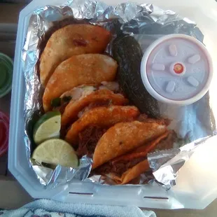 Quesabirria Tacos at Chavira's. Messy but so good. Takeout only. They could use a few picnic tables out front.