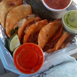 Quesabirria Tacos with consome and flavorful pepper at Chavira's Market on Sand Castle Ave. Really good.