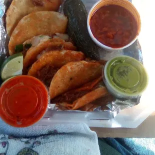 Chavira's Quesabirria Tacos. Small tortilla but really tasty meat with good consome. Rate them an "A "