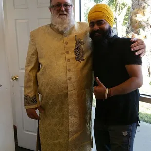 Here is the custom made Sherwani on my hubby and the shop owner...