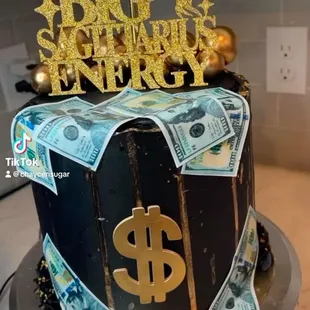 a cake decorated with money