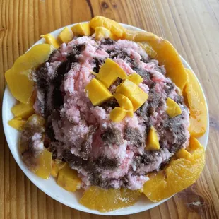 Strawberry Build Your Old Bing Bowl with fresh mango, peaches (canned :/ ), and chocolate syrup