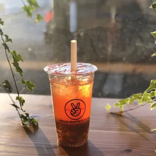 Peach blossom signature tea with basil seeds &amp; aloe topping