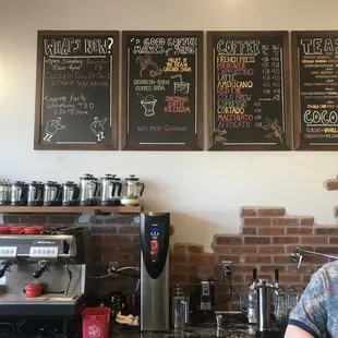 a man working at a coffee shop