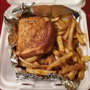 The famous grilled cheese that is supposed to have FOUR slices of grilled cheese and come on sourdough bread.
