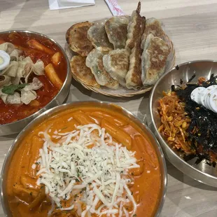 Signature set: Rose Teokbokki, Spicy Cold Noodle, Mandu Sample  Original Teokbokki: Complimentary from the manager