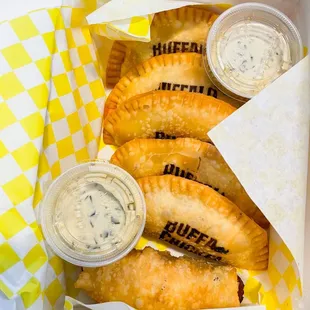 a variety of pastries in a box