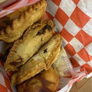 CHEESY PINEAPPLE BACON EMPANADA