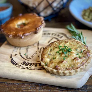 two pies on a cutting board