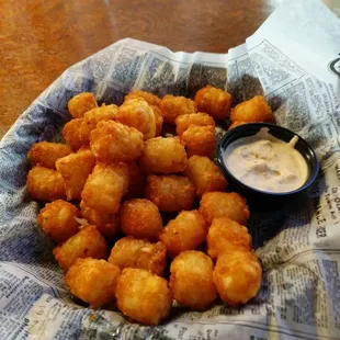 Tots with seasoned sour cream