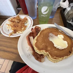 Pancakes, hash browns and bacon