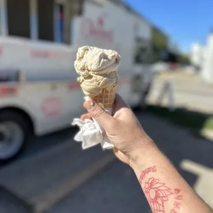 Cinnamon churro on top coffee bean on the bottom