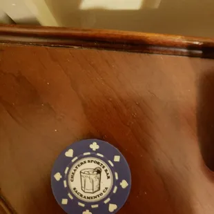 A Cheaters  Sports Bar classic chip. Many of these chips were and are still given out for a rain check on a free drink.