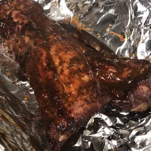 a piece of meat on tin foil