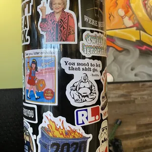 stickers on a pole