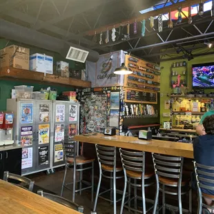 two men sitting at the bar