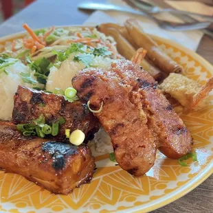 Island Combo: Consist of Marinate Pork ribs, Filipino Sweet pork sausage, Coconut shrimp and Lumpia.