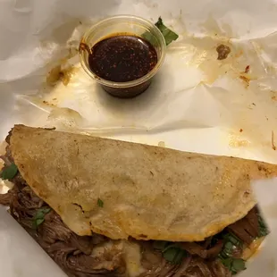 Birria tacos - get this too!!!  That&apos;s the spicy salsa paste up top, will have to find out what it is because it&apos;s addicting.