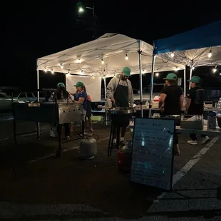 a group of people under a tent