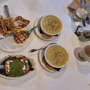 My meal is the pesto chicken and the other meal is chicken and fries.  Two cream of cauliflower-asparagus type soups were also ordered.