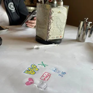 a woman sitting at a table