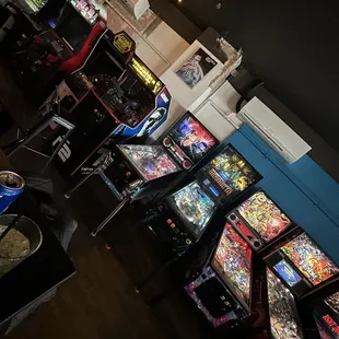 a row of pinball machines