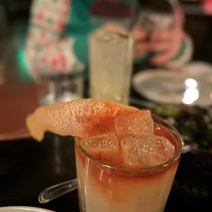 a cocktail with a garnish garnish garnish garnish garnish garnish ga