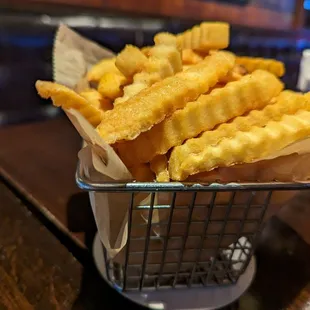 The fries are served in a fryer basket. Nice touch!