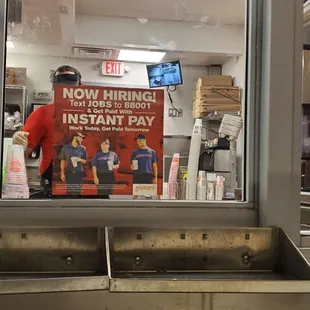 a sign in a store window