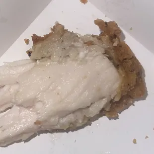 a piece of chicken in a box