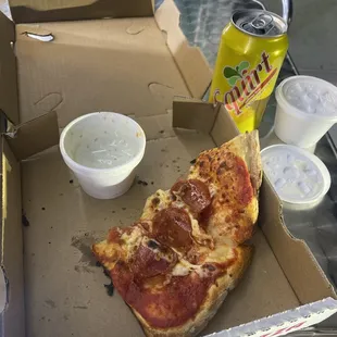 Slice of pepperoni pizza