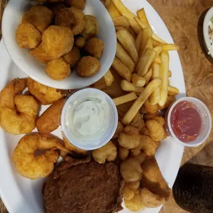 Seafood Platter Crab cake, Flouder, Gulf and Popcorn Shrimp  Fried Okra!!hushpuppies &amp; fries!I substituted popcorn shrimp for scallops ..