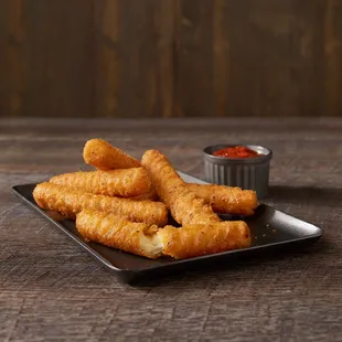 a plate of deep fried fish sticks